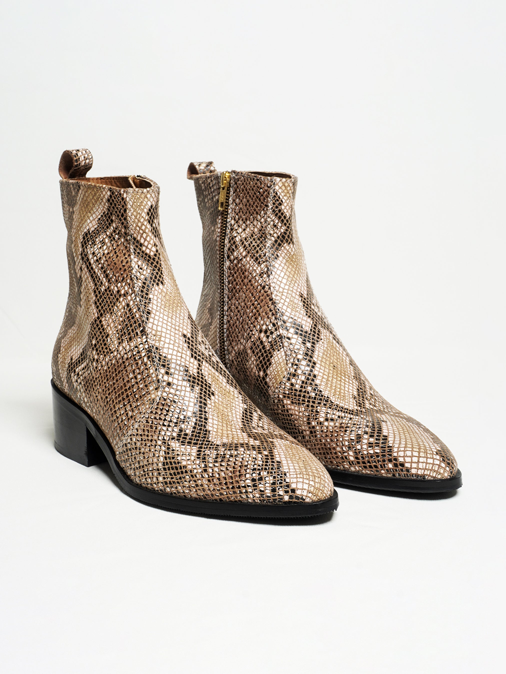 Snakeskin boots, Leather boots, Ankle boots, Ankle boots, Streetwear boots, Designer boots, Luxury boots, Indie boots.