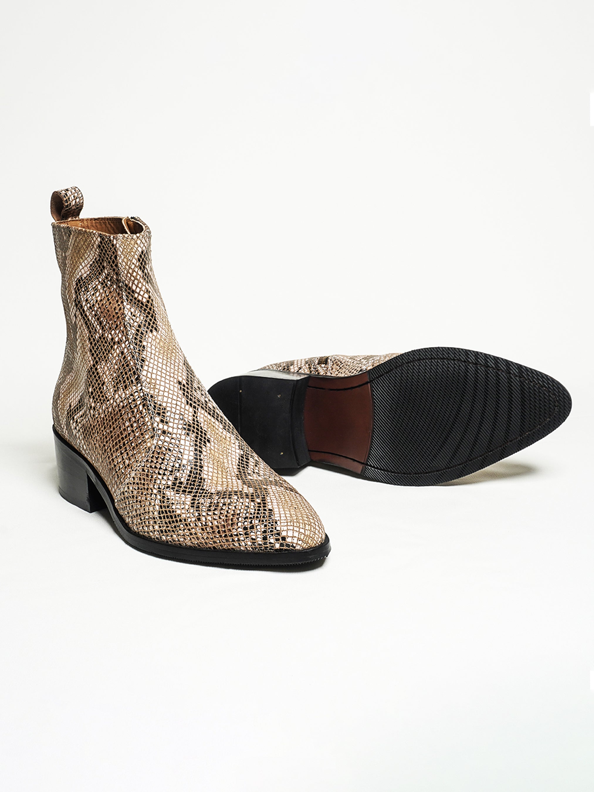 Snakeskin boots, Leather boots, Ankle boots, Ankle boots, Streetwear boots, Designer boots, Luxury boots.